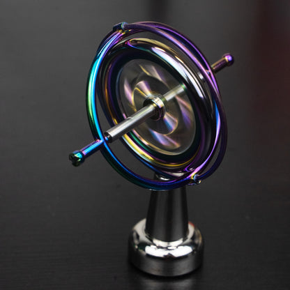 Orbitrix rainbow gyroscope close-up, angled view